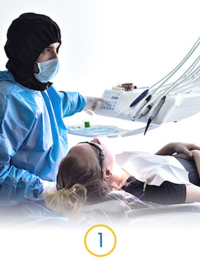 dentist at dental work mexico giving consultation to a patient for a treatment with veneers